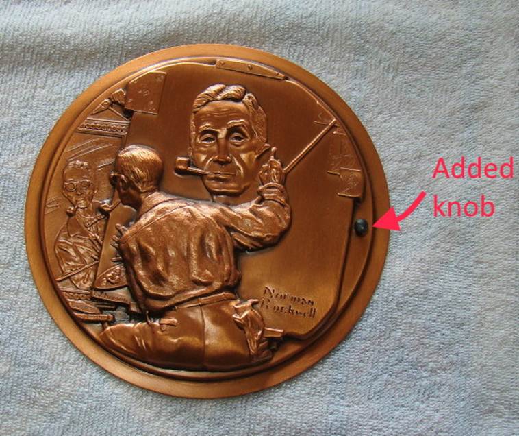 A coin with a picture of a person on it

Description automatically generated with low confidence