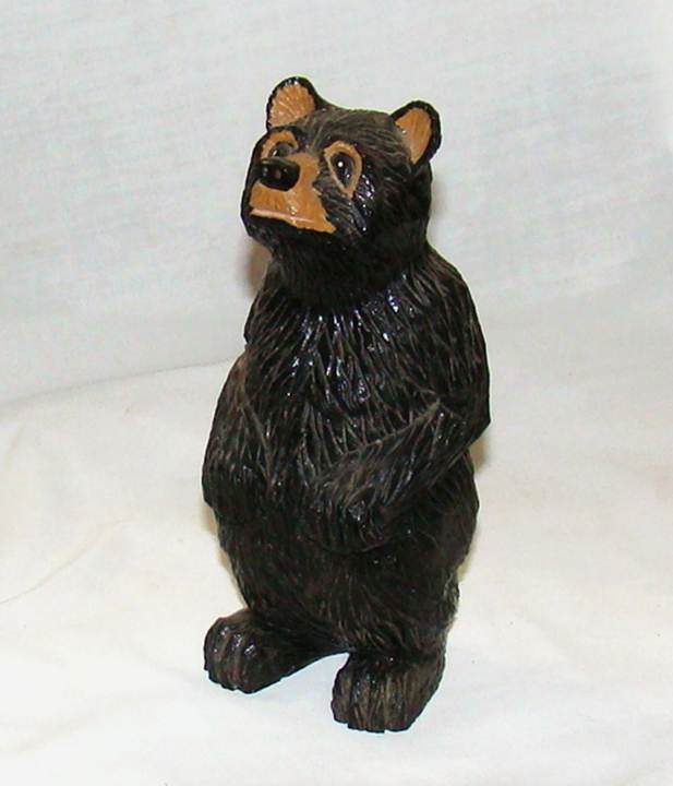 A black bear statue on a white background

AI-generated content may be incorrect.