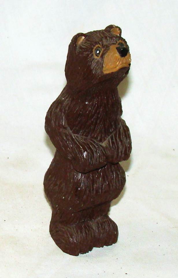 A brown bear figurine

AI-generated content may be incorrect.