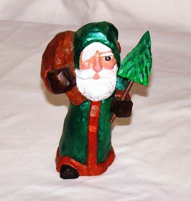 A statue of a santa claus

AI-generated content may be incorrect.