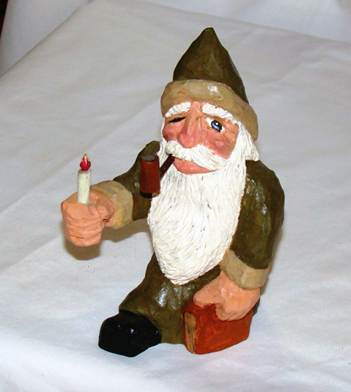 A statue of a gnome holding a pipe and a candle

AI-generated content may be incorrect.