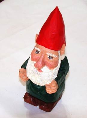 A gnome with a red hat

AI-generated content may be incorrect.