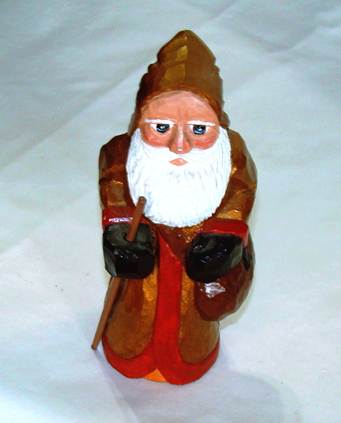 A wooden figurine of a wizard

AI-generated content may be incorrect.