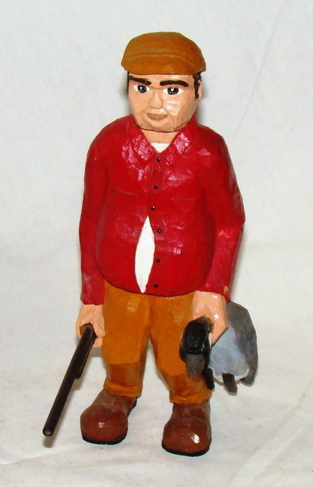 A wooden figurine of a person holding a duck
AI-generated content may be incorrect.