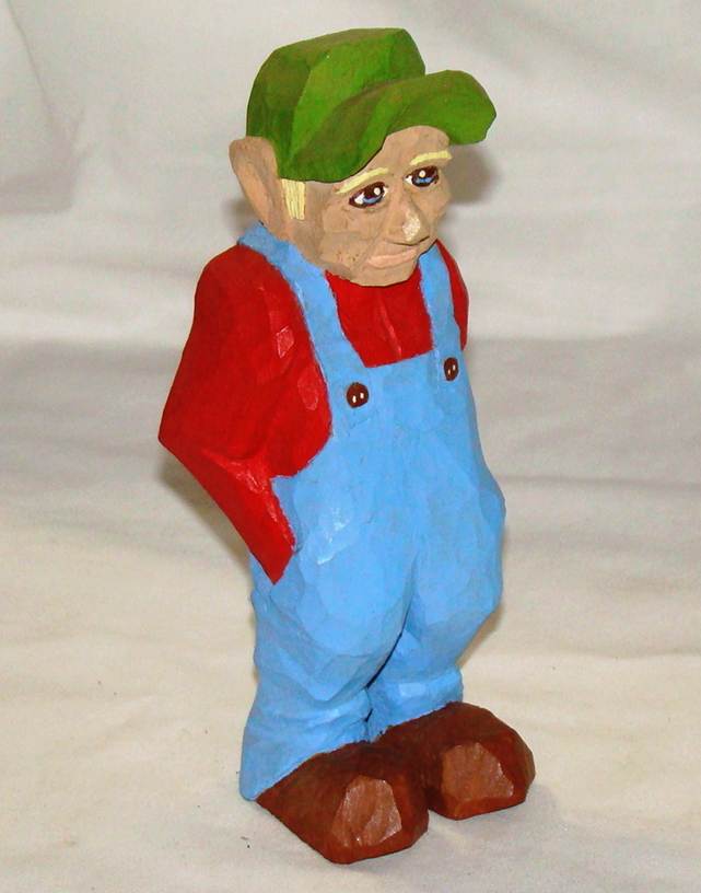 A wooden statue of a gnome
AI-generated content may be incorrect.