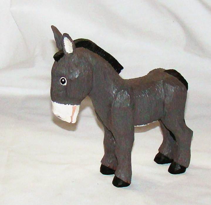 A wooden donkey toy

AI-generated content may be incorrect.