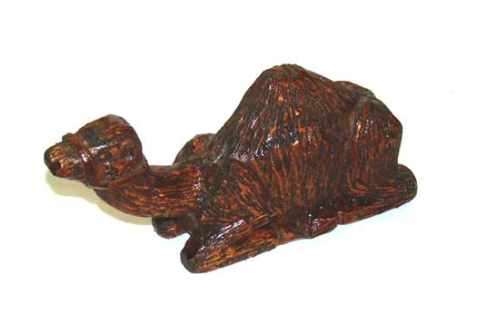 A wooden camel sculpture

AI-generated content may be incorrect.