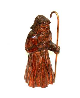 A statue of a person holding a cane

AI-generated content may be incorrect.