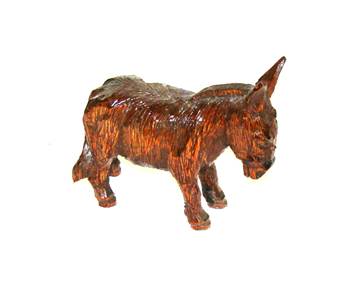 A wooden donkey statue

AI-generated content may be incorrect.
