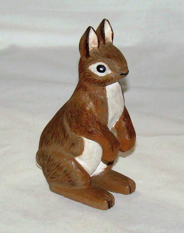 A close-up of a wooden animal

AI-generated content may be incorrect.