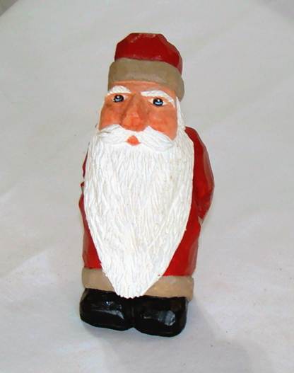 A close-up of a santa claus

AI-generated content may be incorrect.