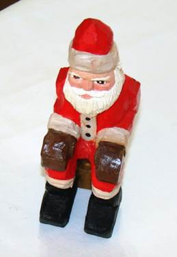 A close-up of a santa claus

AI-generated content may be incorrect.