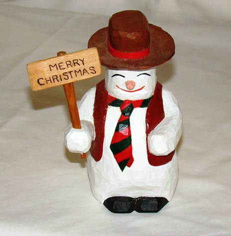 A snowman holding a sign

AI-generated content may be incorrect.