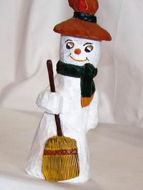 A snowman with a broom

AI-generated content may be incorrect.