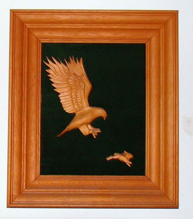 A wooden frame with a bird and rabbit

AI-generated content may be incorrect.