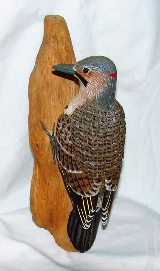 A woodpecker sculpture on a white background

AI-generated content may be incorrect.