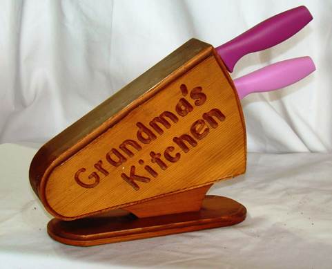 A wooden knife block with pink handles

AI-generated content may be incorrect.