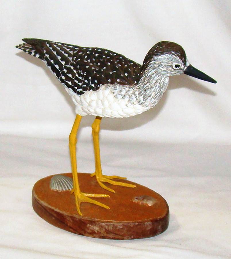 A statue of a bird

AI-generated content may be incorrect.