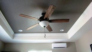 A ceiling with a ceiling fan and a ceiling fan

Description automatically generated with low confidence