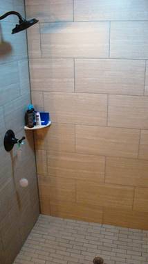 A picture containing wall, indoor, bathroom, floor

Description automatically generated