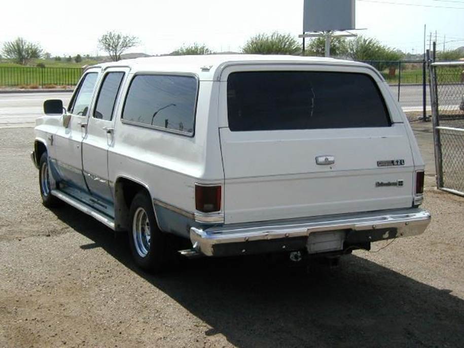 A white van parked on the side of a road

AI-generated content may be incorrect.